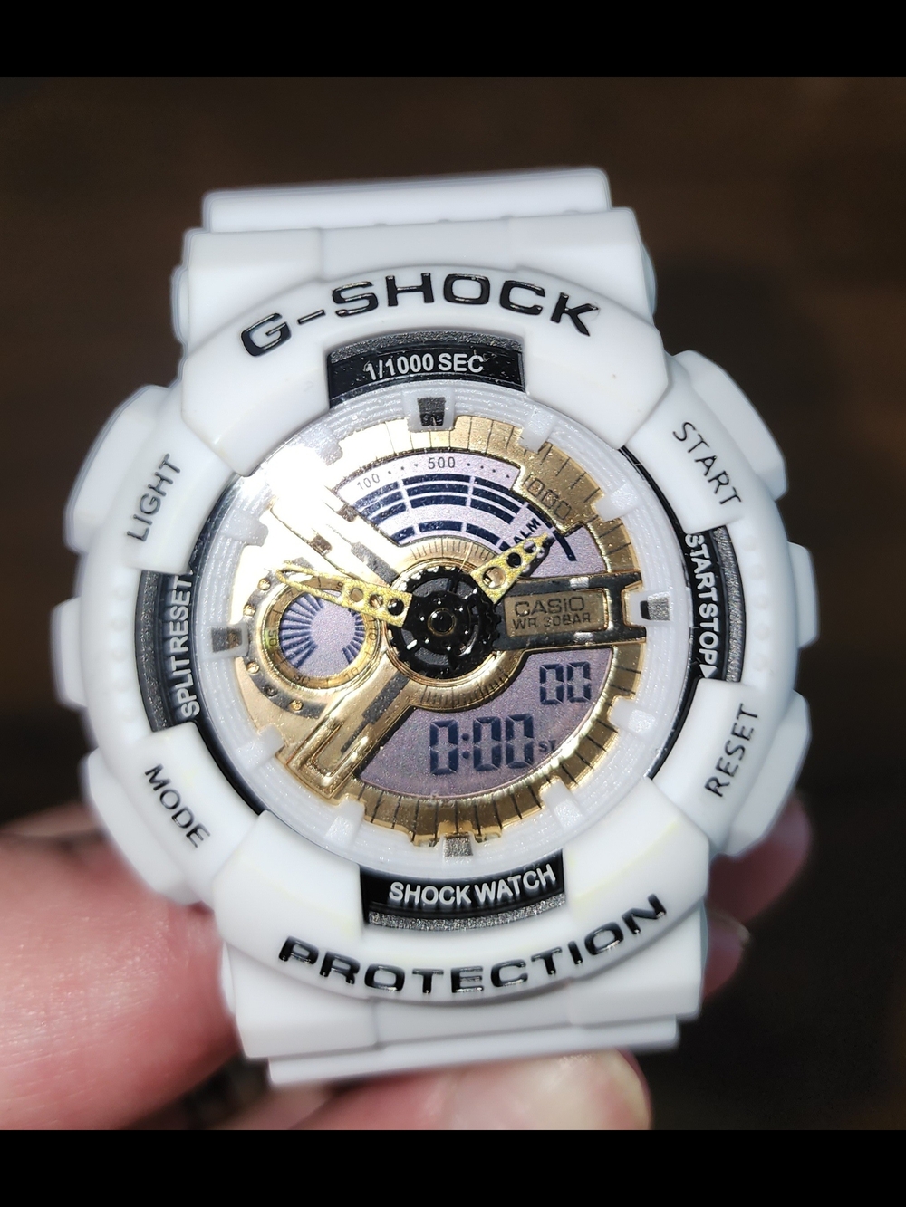 Casio G-Shock GA-110 series model. White and Gold Shock Watch LOV-16A-7A Lover's